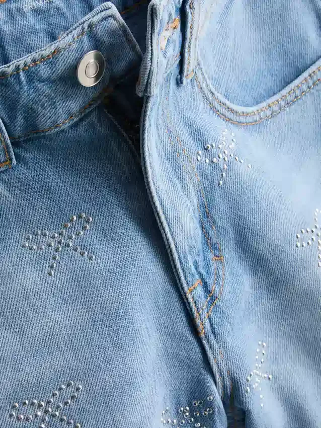 7–15 år | jeansshorts med strassrosett