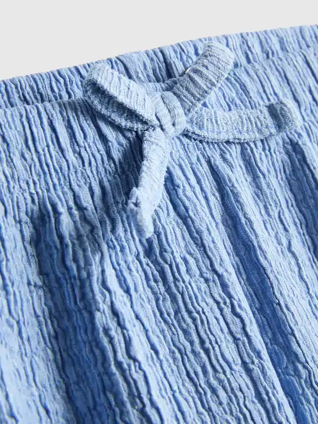 7–15 år | krusade shorts i flera lager