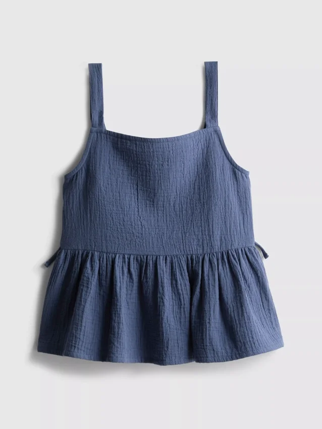 7–15 år | rynkad blus med rosett