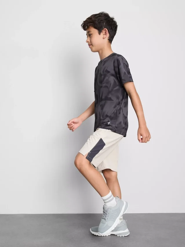 7–15 år | Set med aktiv T-shirt och shorts