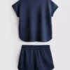 7–15 år | Set med boxig T-shirt och löparshorts