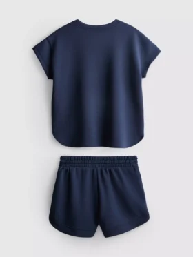 7–15 år | Set med boxig T-shirt och löparshorts