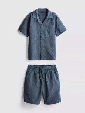 7–15 år | Set med kortärmad knäppskjorta och shorts i texturerat tyg
