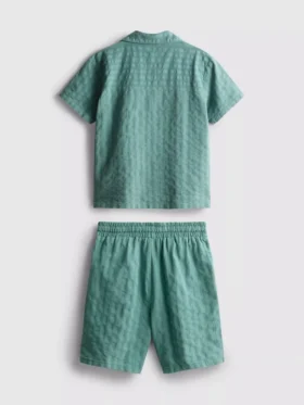 7–15 år | Set med kortärmad knäppskjorta och shorts i texturerat tyg