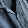 7–15 år | Set med kortärmad knäppskjorta och shorts i texturerat tyg