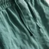 7–15 år | Set med kortärmad knäppskjorta och shorts i texturerat tyg