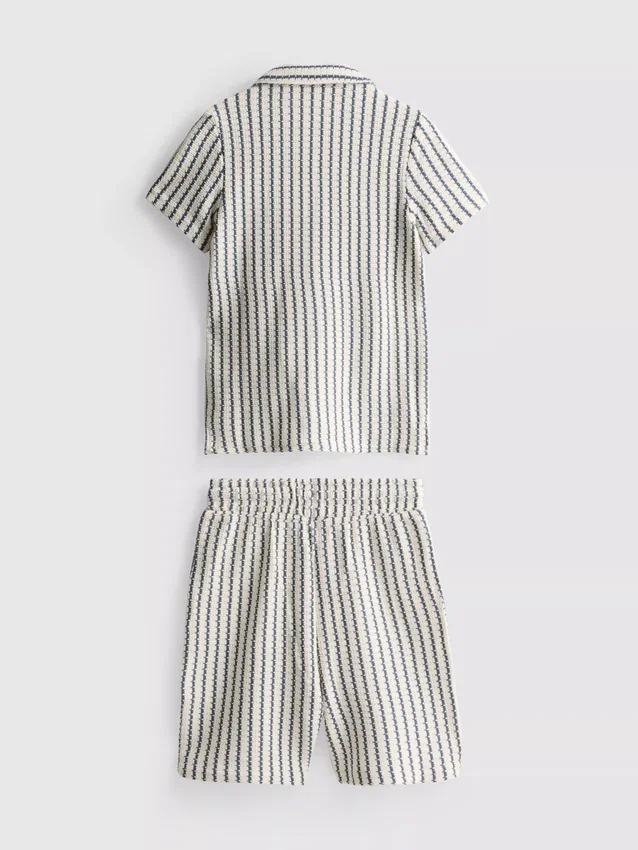7–15 år | Set med randig stickad skjorta och shorts