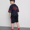 7–15 år | Set med T-shirt och shorts i aktivt nätmaterial