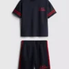 7–15 år | Set med T-shirt och shorts i aktivt nätmaterial