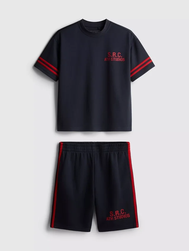 7–15 år | Set med T-shirt och shorts i aktivt nätmaterial