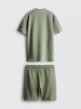 7–15 år | Set med texturerad polotröja och shorts