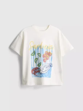 7–15 år | T-shirt i oversized-modell med grafiskt tryck