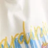 7–15 år | T-shirt i oversized-modell med grafiskt tryck