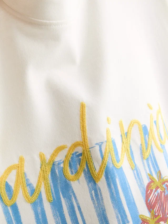 7–15 år | T-shirt i oversized-modell med grafiskt tryck