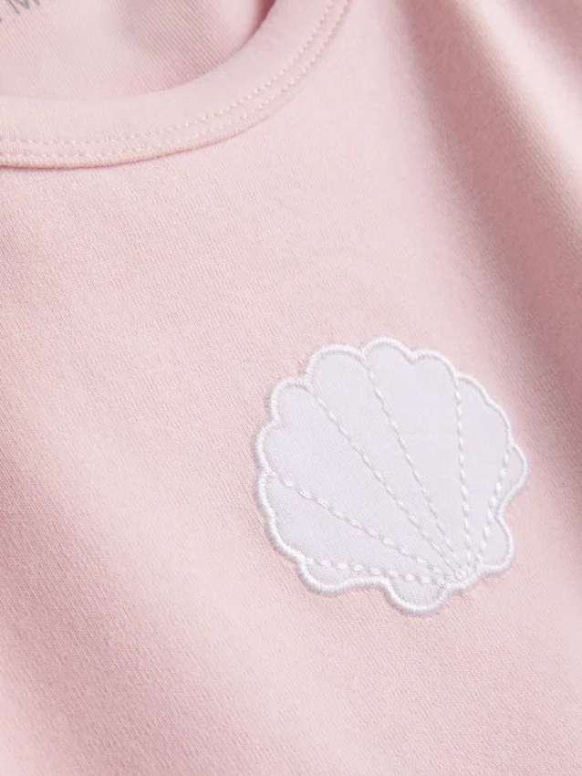 7–15 år | T-shirt med applikation