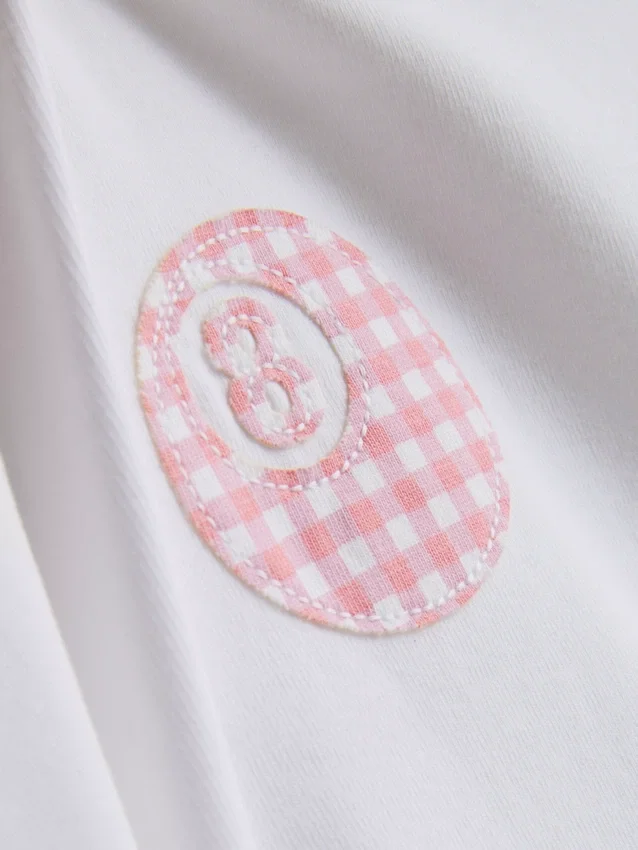 7–15 år | T-shirt med applikation