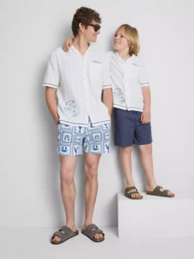 7–15 år | T-shirt med broderad fisk