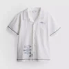 7–15 år | T-shirt med broderad fisk