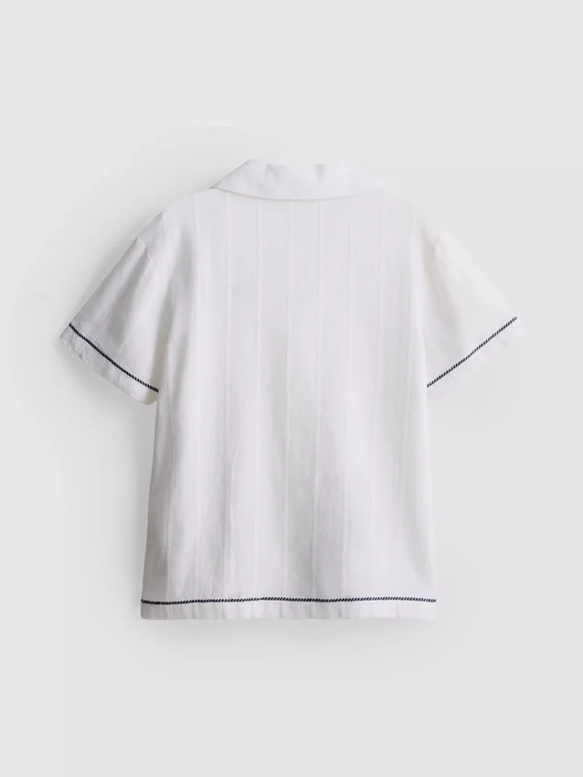 7–15 år | T-shirt med broderad fisk