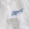 7–15 år | T-shirt med broderad fisk