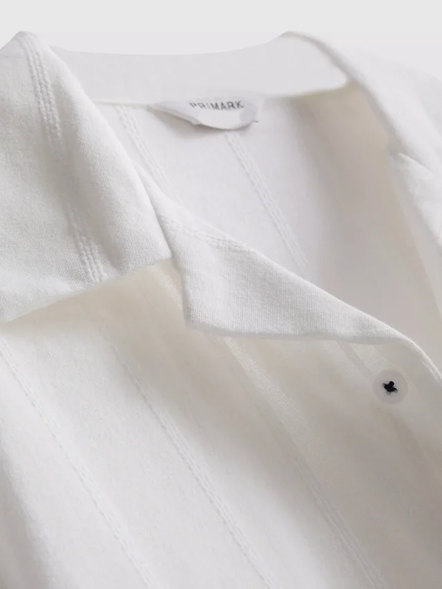 7–15 år | T-shirt med broderad fisk