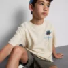 7–15 år | T-shirt med palmmotiv och struktur