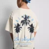 7–15 år | T-shirt med palmmotiv och struktur