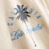 7–15 år | T-shirt med palmmotiv och struktur