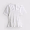 7–15 år | T-shirt med rynkad peplum