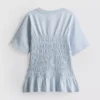 7–15 år | T-shirt med rynkad peplum