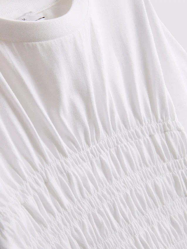 7–15 år | T-shirt med rynkad peplum