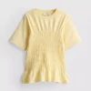 7–15 år | T-shirt med rynkad peplum