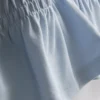 7–15 år | T-shirt med rynkad peplum