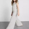 7–15 år | texturerade byxor med vida ben
