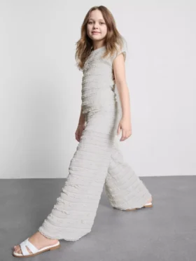7–15 år | texturerade byxor med vida ben