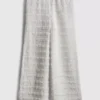 7–15 år | texturerade byxor med vida ben
