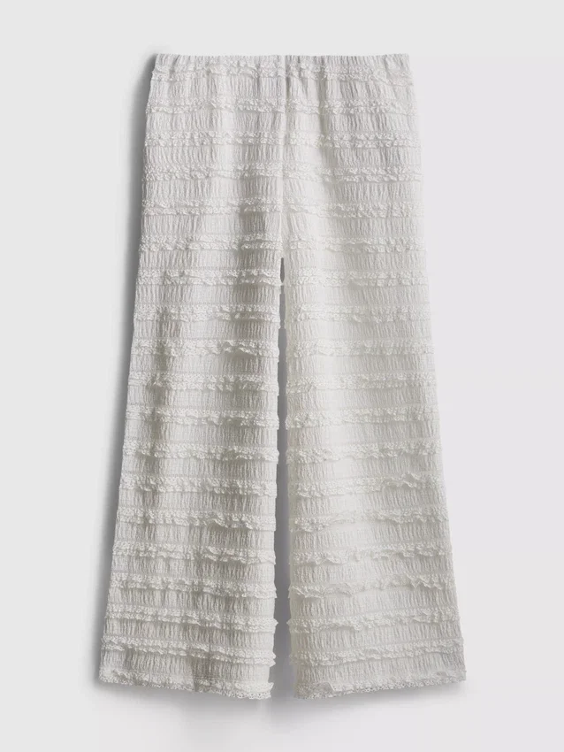 7–15 år | texturerade byxor med vida ben