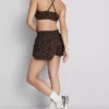 Aktiv kort topp med leopardmönster och racerback