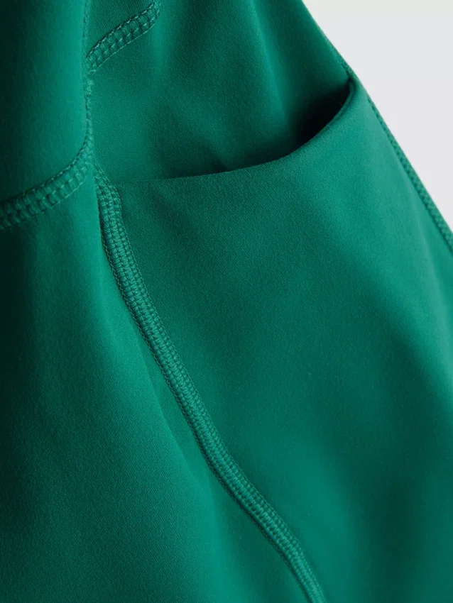 Aktiva capri-leggings med hög midja