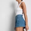 Asymmetrisk skort i bomullsdenim