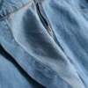Asymmetrisk skort i bomullsdenim