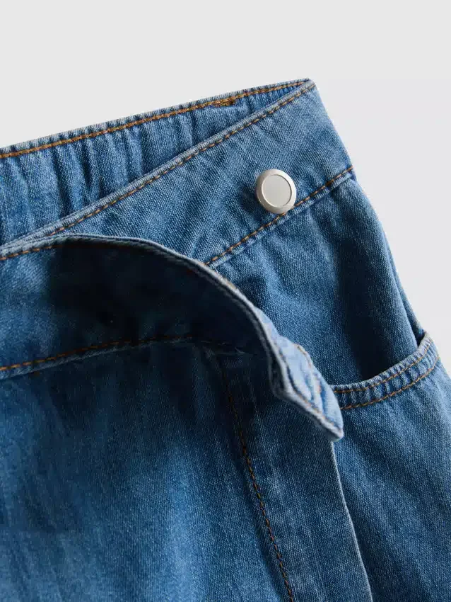 Asymmetrisk skort i bomullsdenim