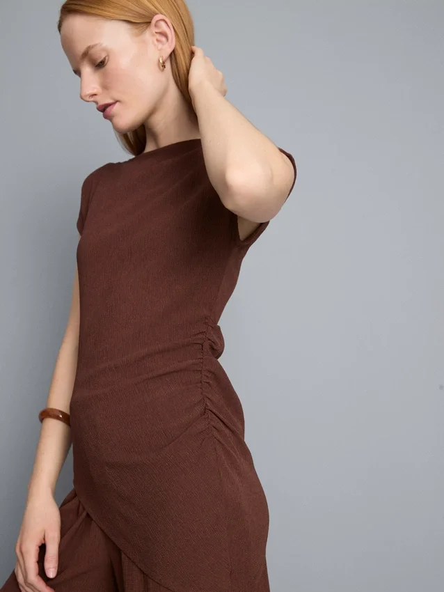Asymmetrisk skrynklig topp