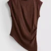 Asymmetrisk skrynklig topp