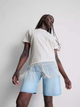 Asymmetrisk T-shirt i bomull med fransar