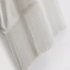 Asymmetrisk T-shirt i bomull med fransar