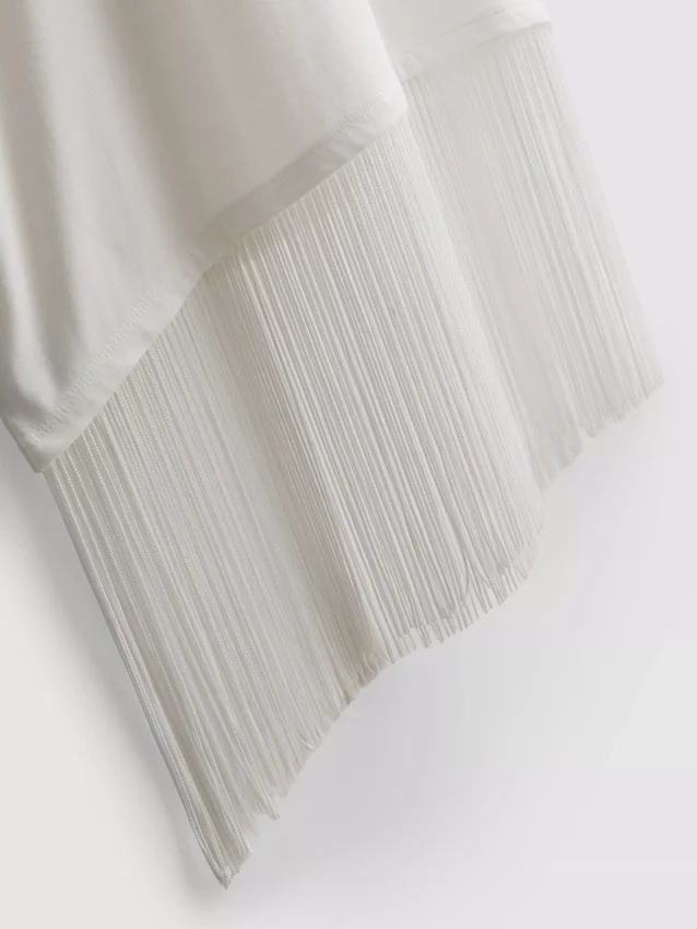 Asymmetrisk T-shirt i bomull med fransar
