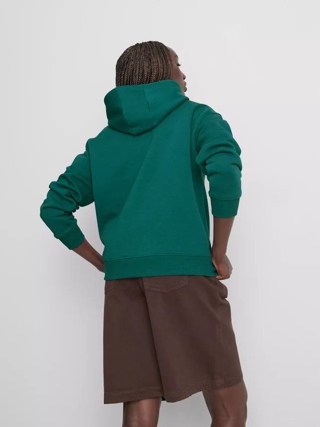 Avslappnad hoodie i sportklubbstil
