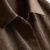 Avslappnad skjorta i texturerad satin
