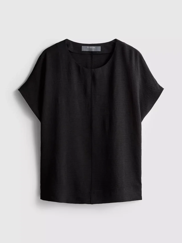 Avslappnad T-shirt med rund hals och luftgenomströmning
